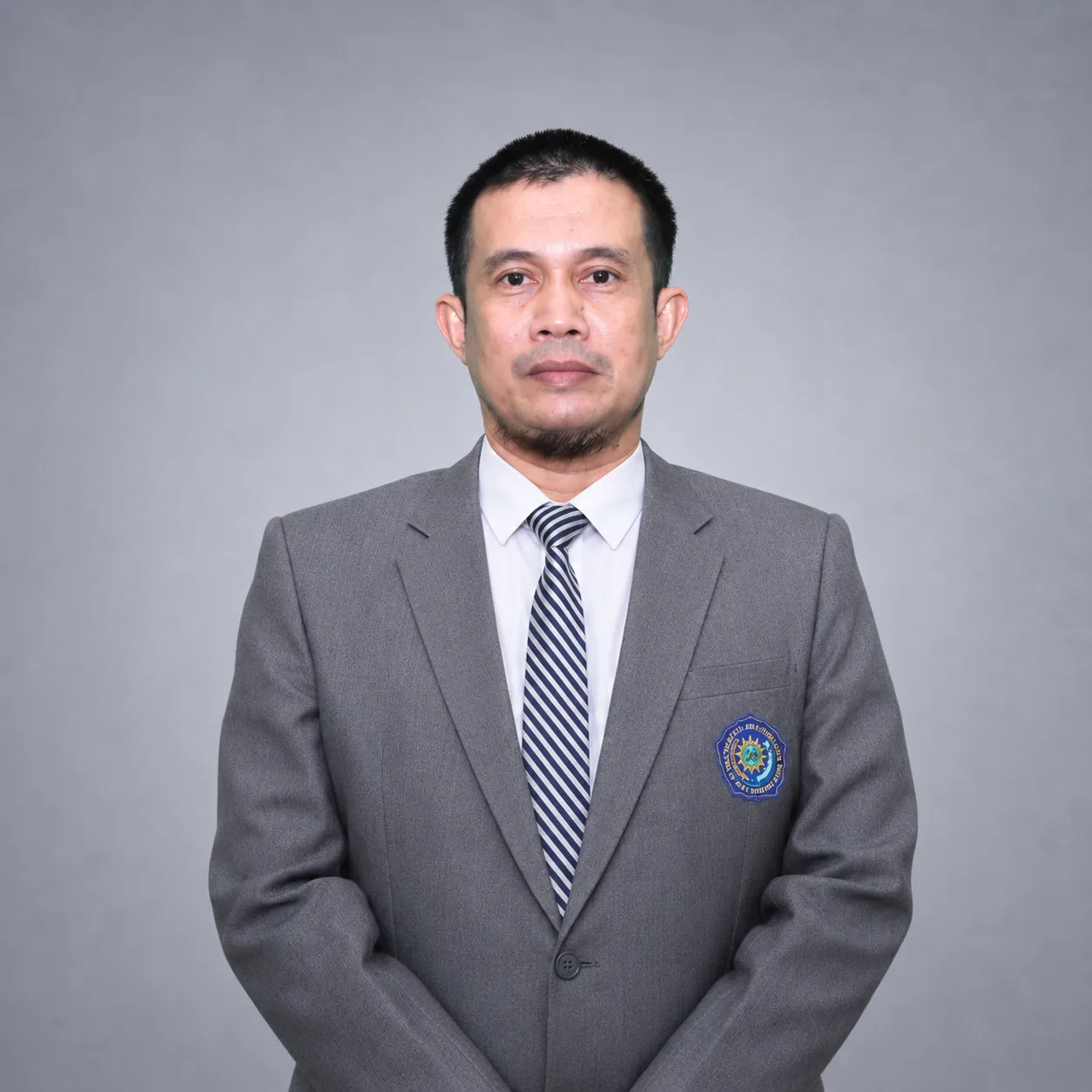 Dr. Andi Adam