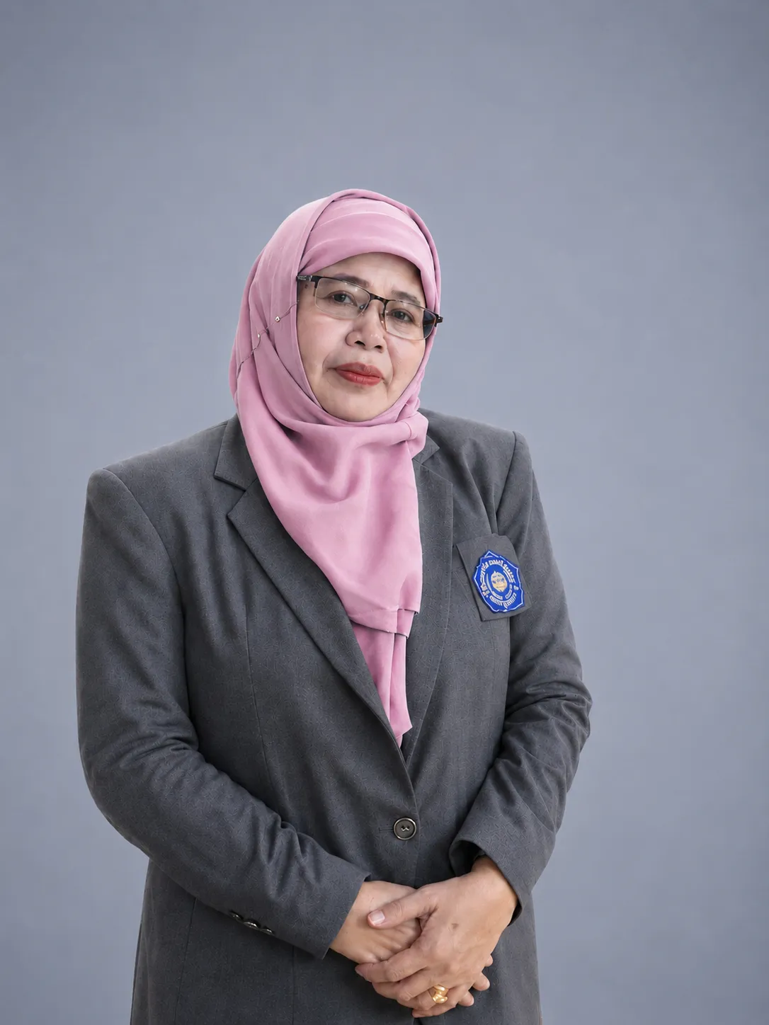 Prof. Dr. Dra. Munirah